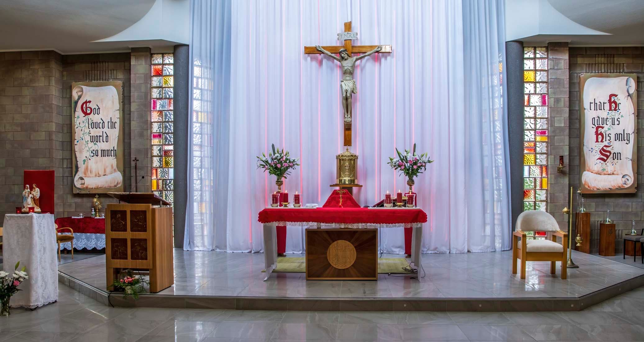 The altar and sanctuary inside St. Luke's Catholic Parish Church